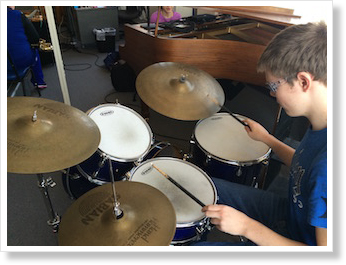 Student playing drums